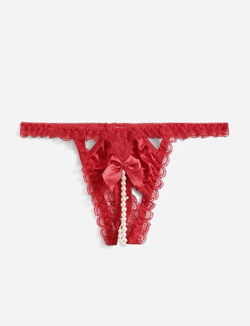 Tanga con abertura y perlas