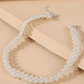 Collar con perla artificial